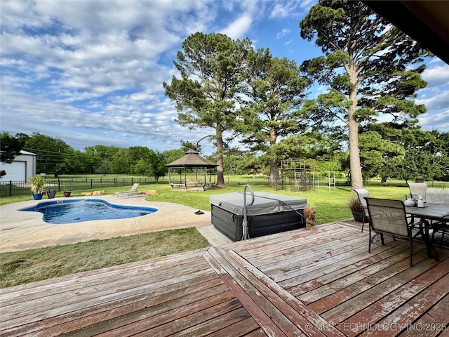 74232 S 320th Rd, Wagoner, OK 74467 - deck featuring a hot tub, a gazebo, outdoor dining area, view of wooded area, and a patio