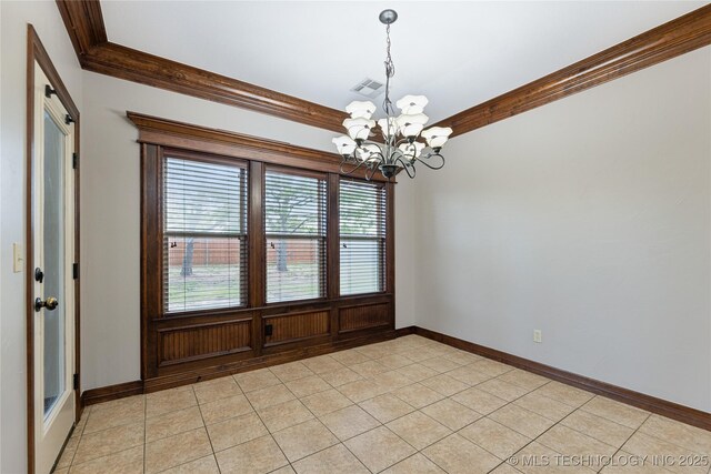 7083 E 85th St N, Owasso, OK 74055 - unfurnished room featuring a chandelier, baseboards, crown molding, and light tile patterned flooring