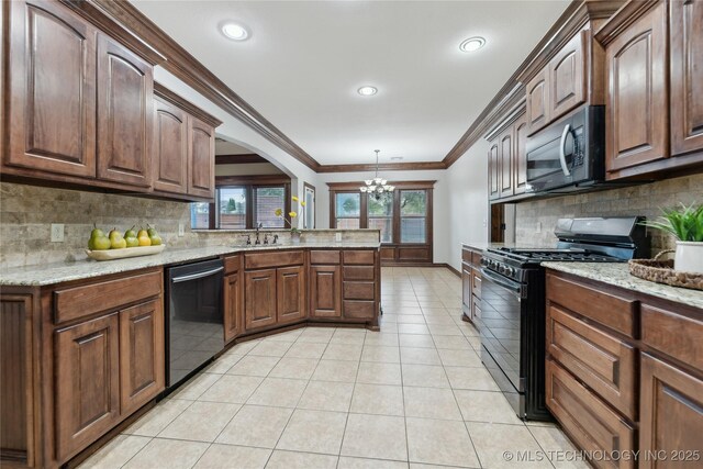 7083 E 85th St N, Owasso, OK 74055 - kitchen featuring black gas stove, dishwasher, a chandelier, tasteful backsplash, and light tile patterned floors