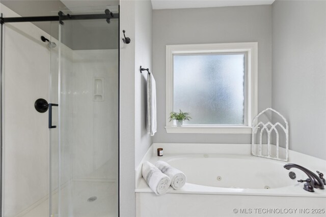 7083 E 85th St N, Owasso, OK 74055 - full bath with a shower stall and a tub with jets