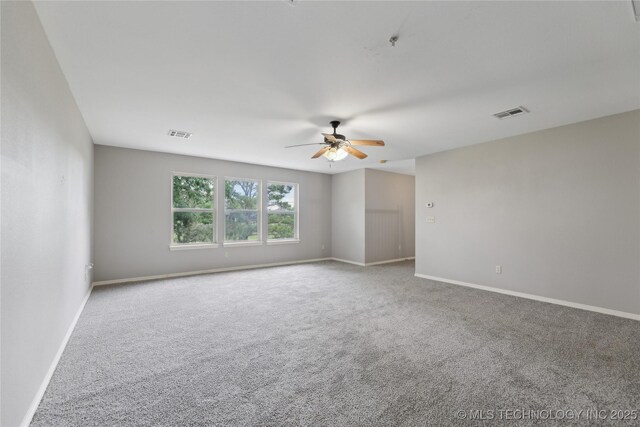 7083 E 85th St N, Owasso, OK 74055 - carpeted empty room featuring a ceiling fan, baseboards, and fire sprinkler in ceiling