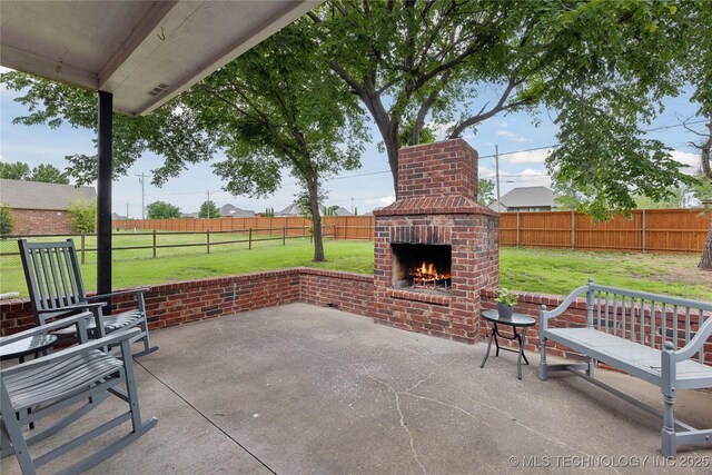 7083 E 85th St N, Owasso, OK 74055 - view of patio with an outdoor brick fireplace