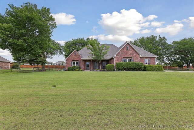 7083 E 85th St N, Owasso, OK 74055 - view of front of home featuring brick siding and a shingled roof
