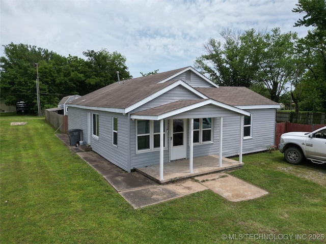 520 S Broadway Ave, Haskell, OK 74436 - view of front of home with a shingled roof and a patio area