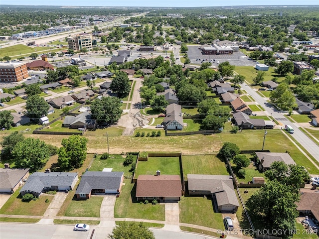 aerial overview of property's location with nearby suburban area