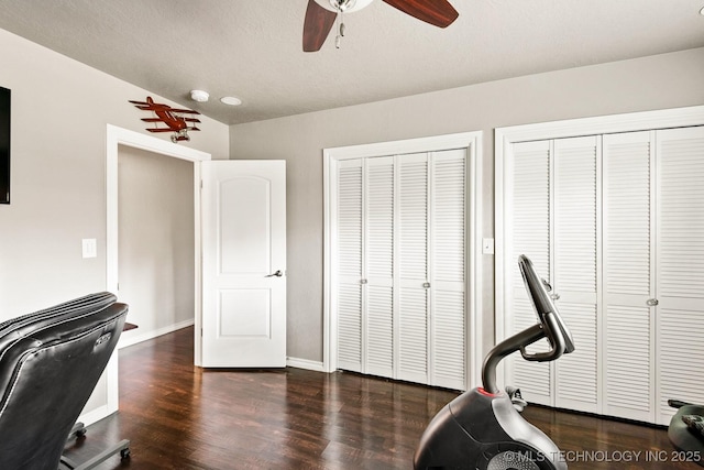 1300 S Mississippi, Ada, OK 74820 - exercise area featuring a ceiling fan, wood finished floors, baseboards, and a sink