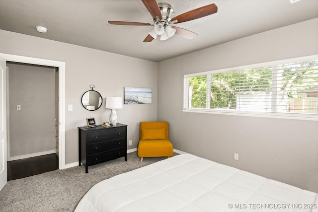 1300 S Mississippi, Ada, OK 74820 - carpeted bedroom with baseboards and ceiling fan