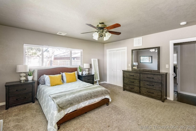 1300 S Mississippi, Ada, OK 74820 - carpeted bedroom with a closet, baseboards, and ceiling fan