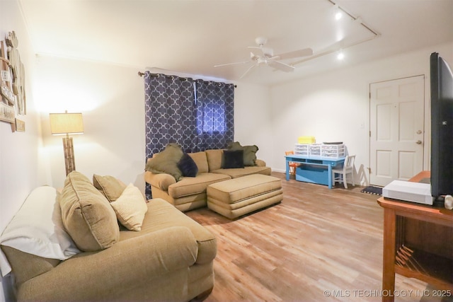 5529 S New Haven Ave, Tulsa, OK 74135 - living room with a ceiling fan, track lighting, and wood finished floors