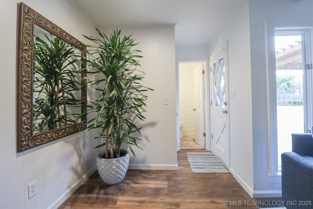 5529 S New Haven Ave, Tulsa, OK 74135 - entrance foyer with wood finished floors, crown molding, and baseboards