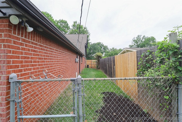 5529 S New Haven Ave, Tulsa, OK 74135 - view of side of home featuring a gate and brick siding