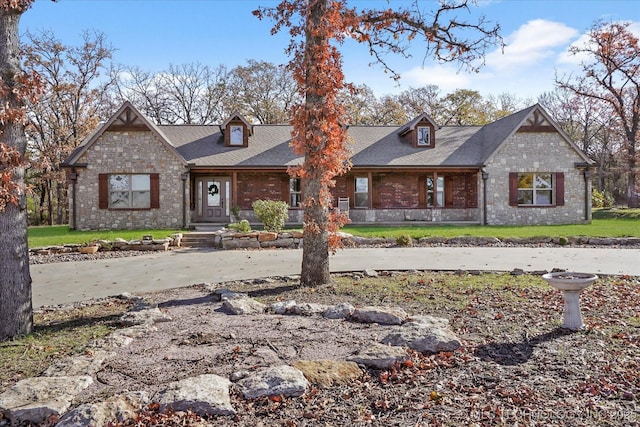 15209 S 89th W Ave, Sapulpa, OK 74066 - view of front facade featuring brick siding, a front lawn, and a shingled roof