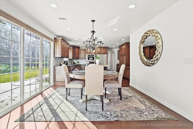 15209 S 89th W Ave, Sapulpa, OK 74066 - dining room featuring a chandelier, recessed lighting, baseboards, and wood finished floors