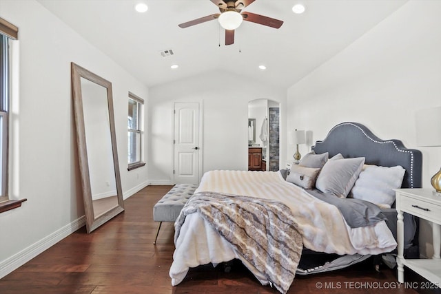 15209 S 89th W Ave, Sapulpa, OK 74066 - bedroom featuring arched walkways, vaulted ceiling, dark wood-type flooring, recessed lighting, and baseboards