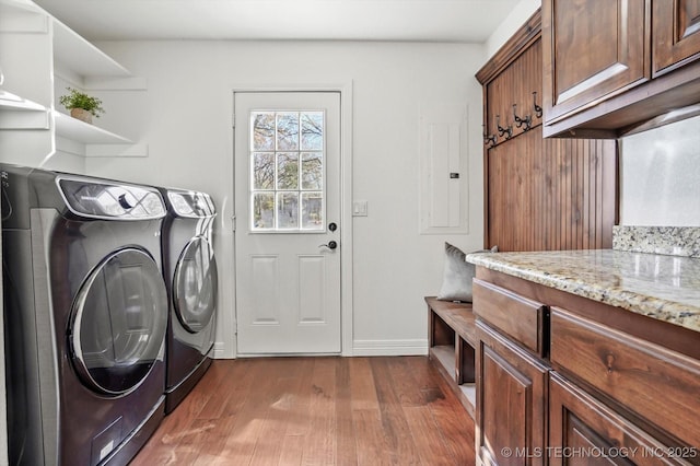 15209 S 89th W Ave, Sapulpa, OK 74066 - washroom featuring cabinet space, washing machine and dryer, dark wood-style flooring, and baseboards