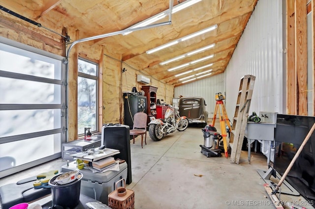 15209 S 89th W Ave, Sapulpa, OK 74066 - garage with an AC wall unit and refrigerator