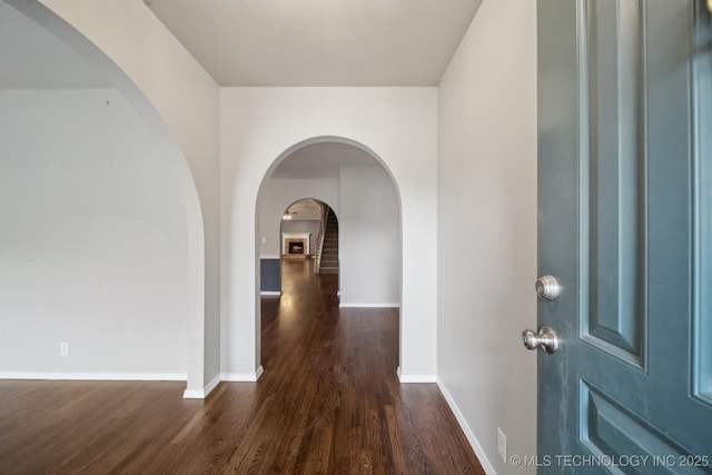 408 S Tamarack Ave, Broken Arrow, OK 74012 - entryway with arched walkways and wood finished floors