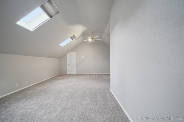 408 S Tamarack Ave, Broken Arrow, OK 74012 - bonus room with a skylight, vaulted ceiling, carpet, and ceiling fan