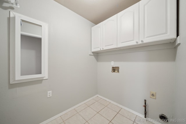 408 S Tamarack Ave, Broken Arrow, OK 74012 - laundry area featuring cabinet space, washer hookup, electric dryer hookup, and light tile patterned floors
