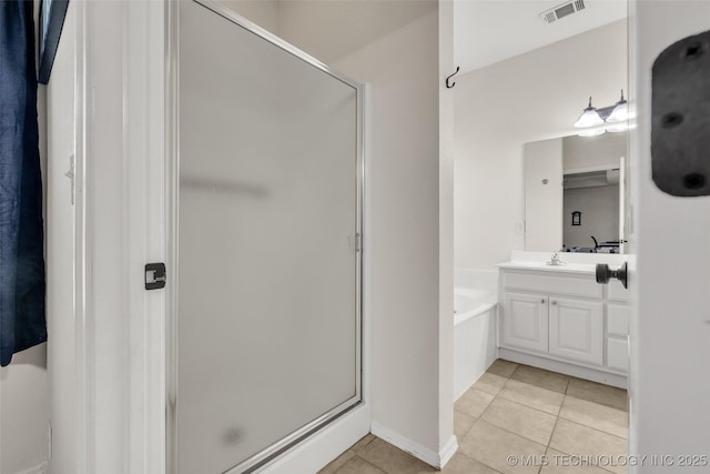 2405 S 13th St, Broken Arrow, OK 74012 - bathroom featuring vanity, a stall shower, tile patterned flooring, and a bath