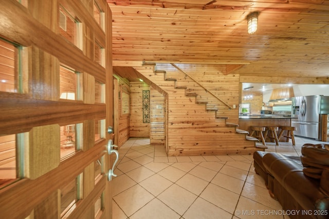 36105 S 4202nd Rd, Inola, OK 74036 - living room with wooden walls, light tile patterned floors, and wood ceiling