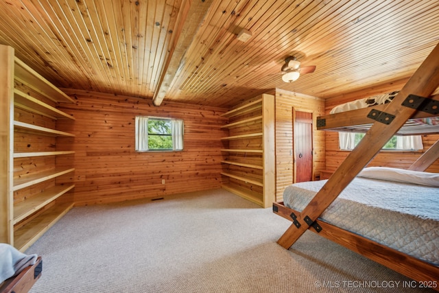 36105 S 4202nd Rd, Inola, OK 74036 - unfurnished bedroom with carpet floors, wooden walls, and wood ceiling