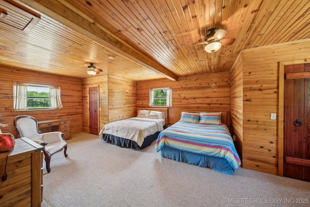 36105 S 4202nd Rd, Inola, OK 74036 - bedroom with carpet flooring, wooden ceiling with exposed beams, and wood walls