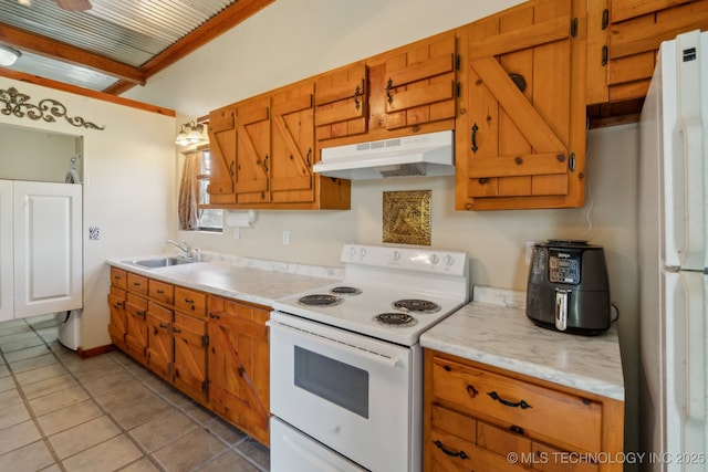 36105 S 4202nd Rd, Inola, OK 74036 - kitchen with under cabinet range hood, white appliances, a sink, light countertops, and light tile patterned floors