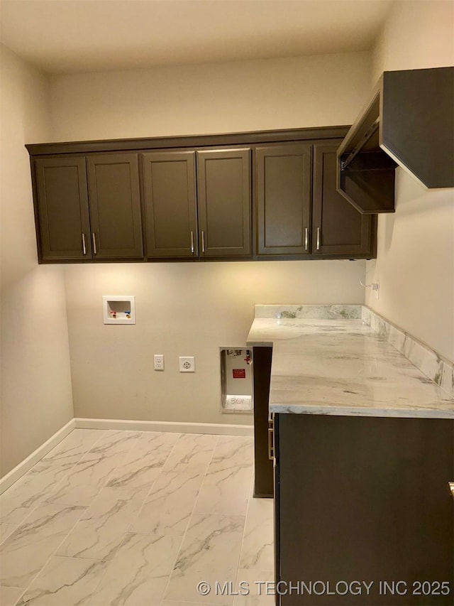 14503 E 80th St N, Owasso, OK 74055 - washroom featuring cabinet space, hookup for a washing machine, light marble finish floors, and baseboards