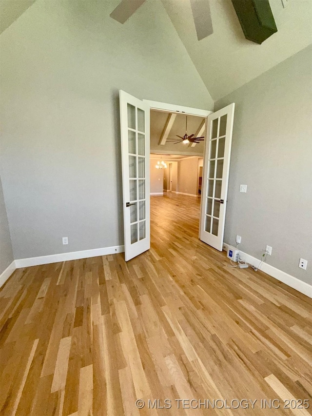 14503 E 80th St N, Owasso, OK 74055 - spare room featuring french doors, ceiling fan, baseboards, light wood-style flooring, and lofted ceiling