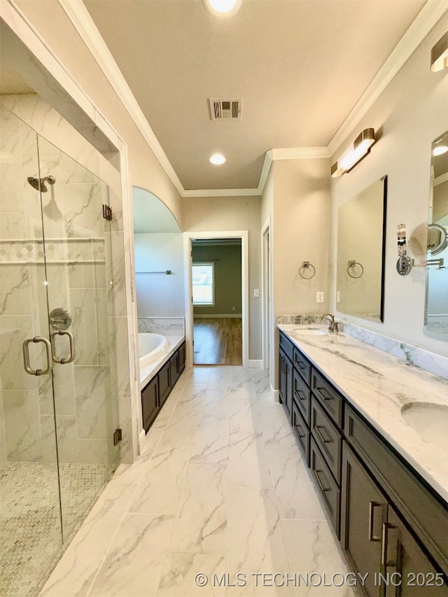 14503 E 80th St N, Owasso, OK 74055 - bathroom featuring a garden tub, ornamental molding, double vanity, a marble finish shower, and marble look tile flooring