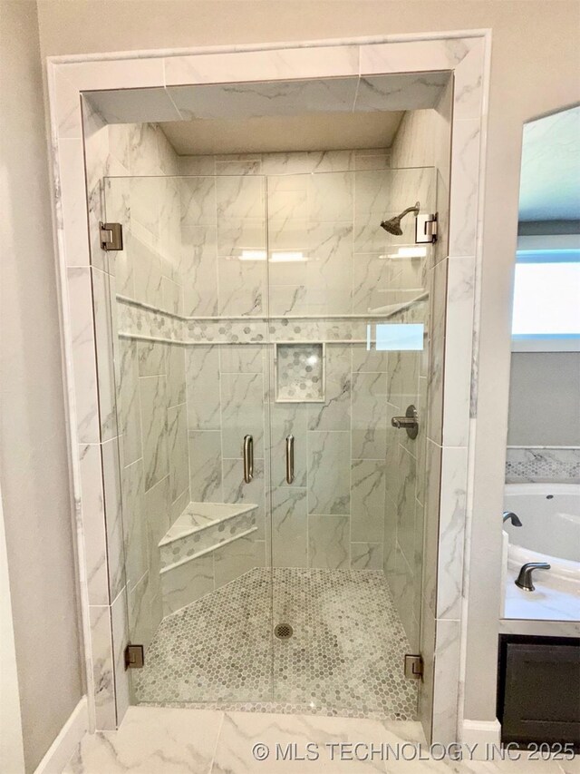 14503 E 80th St N, Owasso, OK 74055 - full bathroom with a shower stall, marble finish flooring, and baseboards