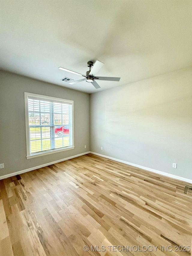 14503 E 80th St N, Owasso, OK 74055 - unfurnished room featuring baseboards, light wood-style flooring, and ceiling fan