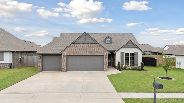 23012 E 104th St S, Broken Arrow, OK 74014 - view of front of home featuring brick siding, an attached garage, driveway, and roof with shingles