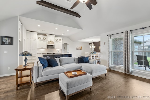 23012 E 104th St S, Broken Arrow, OK 74014 - living room with ceiling fan, recessed lighting, arched walkways, dark wood finished floors, and a chandelier