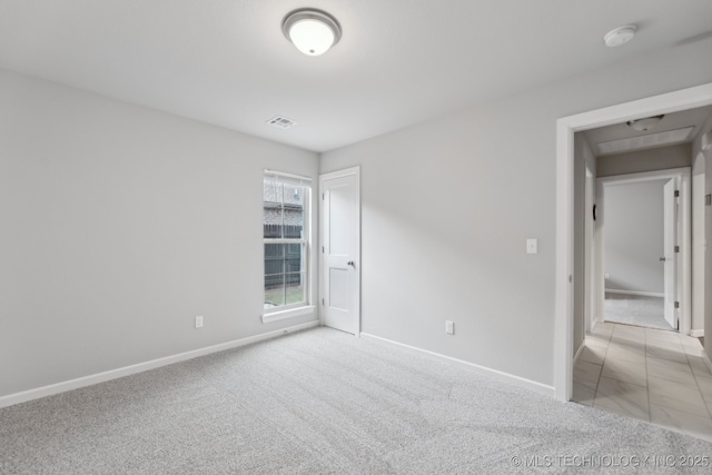 23012 E 104th St S, Broken Arrow, OK 74014 - unfurnished bedroom featuring baseboards and carpet flooring