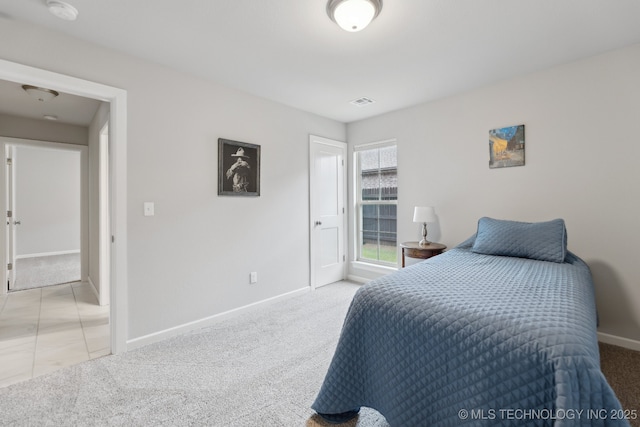 23012 E 104th St S, Broken Arrow, OK 74014 - bedroom featuring baseboards and light carpet