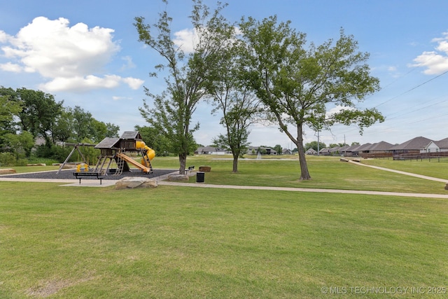 23012 E 104th St S, Broken Arrow, OK 74014 - view of home's community featuring a lawn