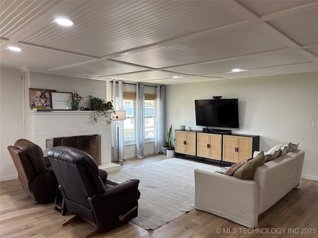 1113 S Meadow Dr, Ardmore, OK 73401 - living room with baseboards, wood finished floors, a brick fireplace, and recessed lighting