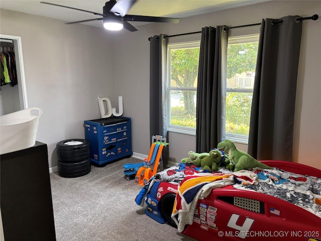 1113 S Meadow Dr, Ardmore, OK 73401 - bedroom with carpet flooring, ceiling fan, and baseboards