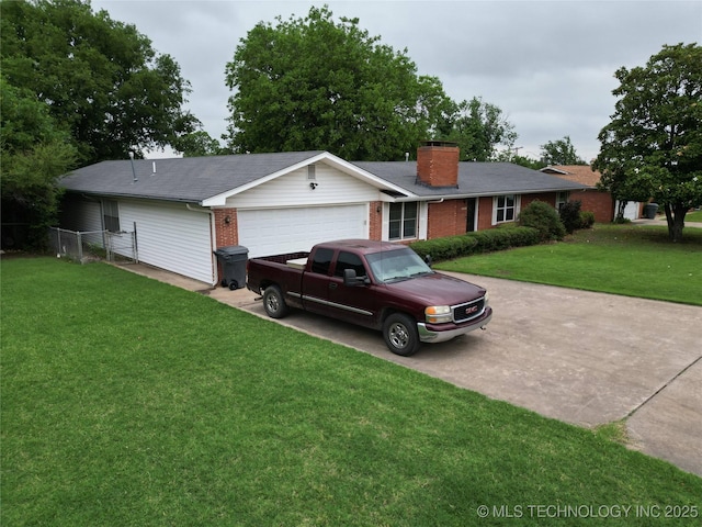 1113 S Meadow Dr, Ardmore, OK 73401 - single story home with a garage, driveway, brick siding, and a chimney
