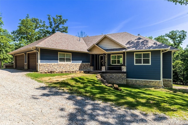11802 Hickory Ln, Claremore, OK 74017 - craftsman house featuring stone siding, roof with shingles, driveway, and a garage