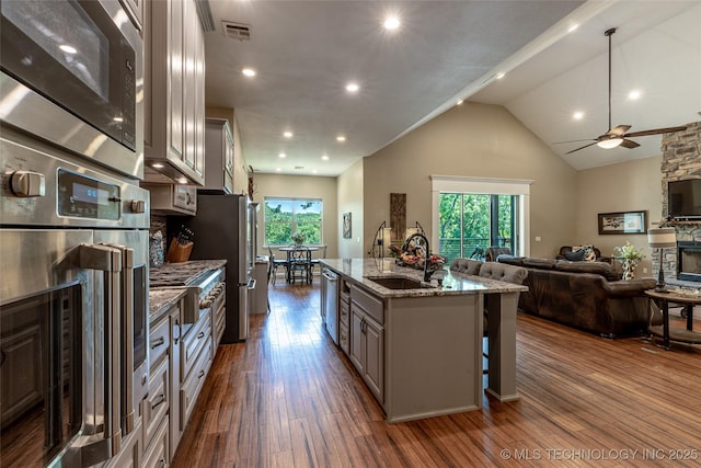 11802 Hickory Ln, Claremore, OK 74017 - kitchen featuring open floor plan, ceiling fan, appliances with stainless steel finishes, plenty of natural light, and recessed lighting