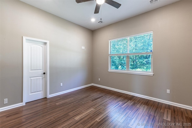 11802 Hickory Ln, Claremore, OK 74017 - empty room with dark wood-type flooring and ceiling fan