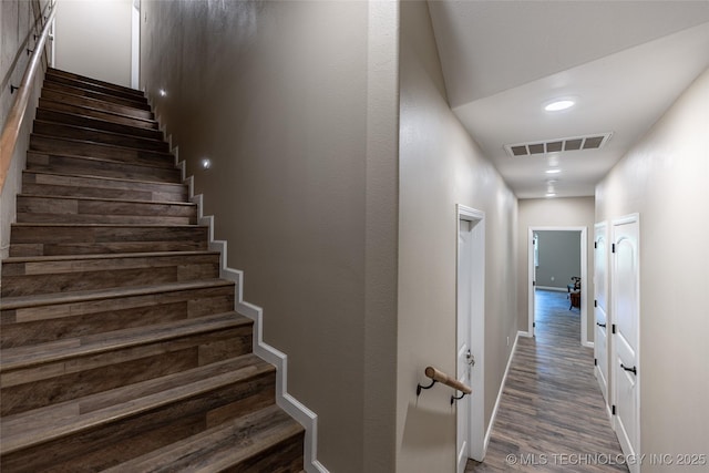 11802 Hickory Ln, Claremore, OK 74017 - stairway featuring wood finished floors and baseboards