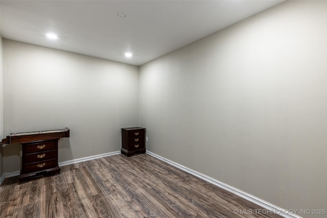 11802 Hickory Ln, Claremore, OK 74017 - spare room featuring dark wood-type flooring and recessed lighting