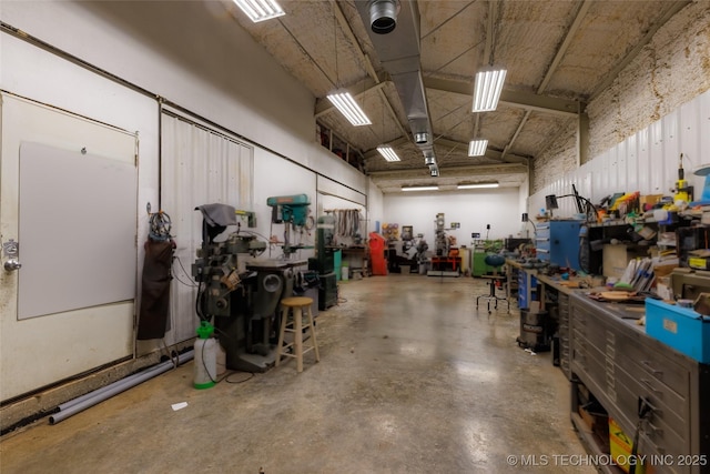 11802 Hickory Ln, Claremore, OK 74017 - garage with a workshop area
