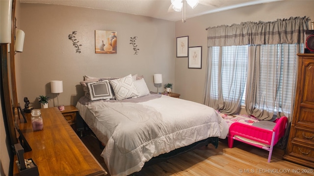 5209 SE Nowata Rd Unit 104B, Bartlesville, OK 74006 - bedroom featuring wood finished floors