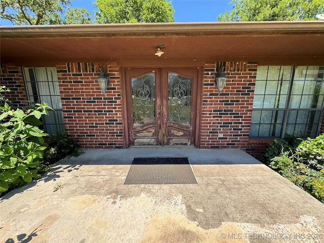 50 Fairway, Burneyville, OK 73430 - doorway to property with brick siding