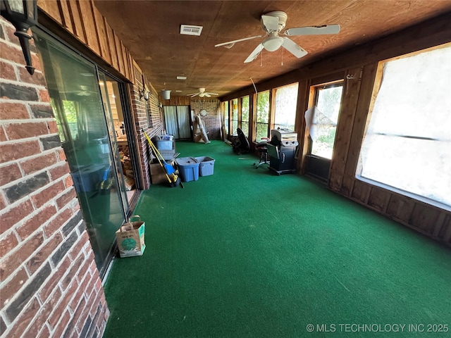 50 Fairway, Burneyville, OK 73430 - unfurnished sunroom with a ceiling fan